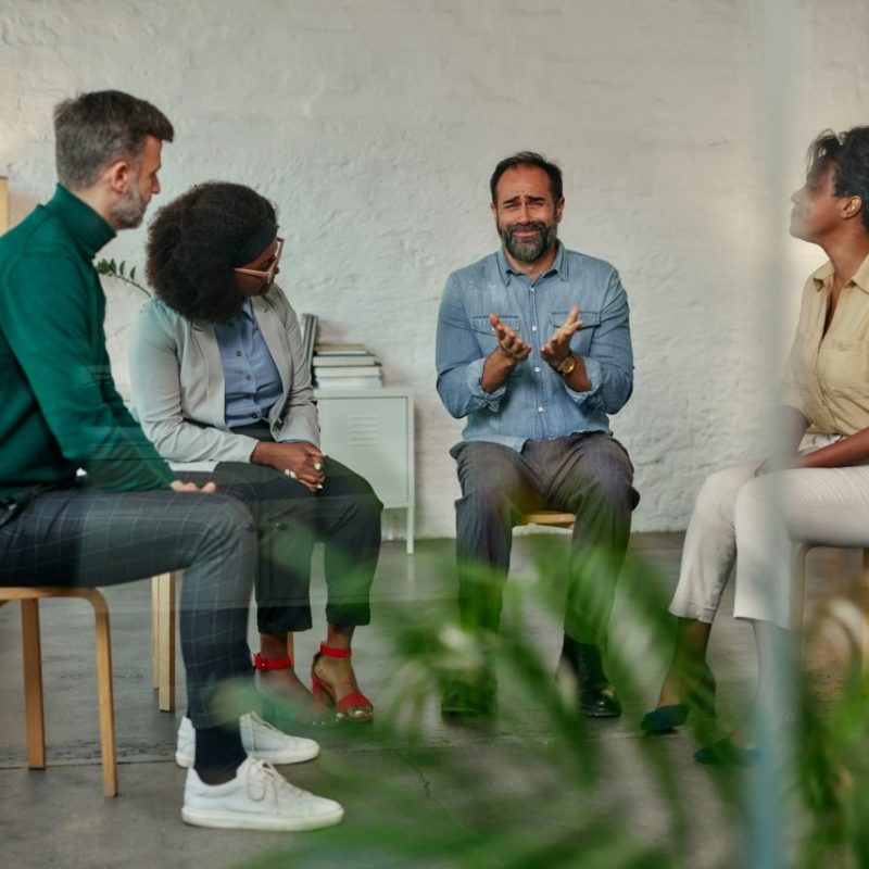 man-talking-to-the-mental-health-support-group.jpg